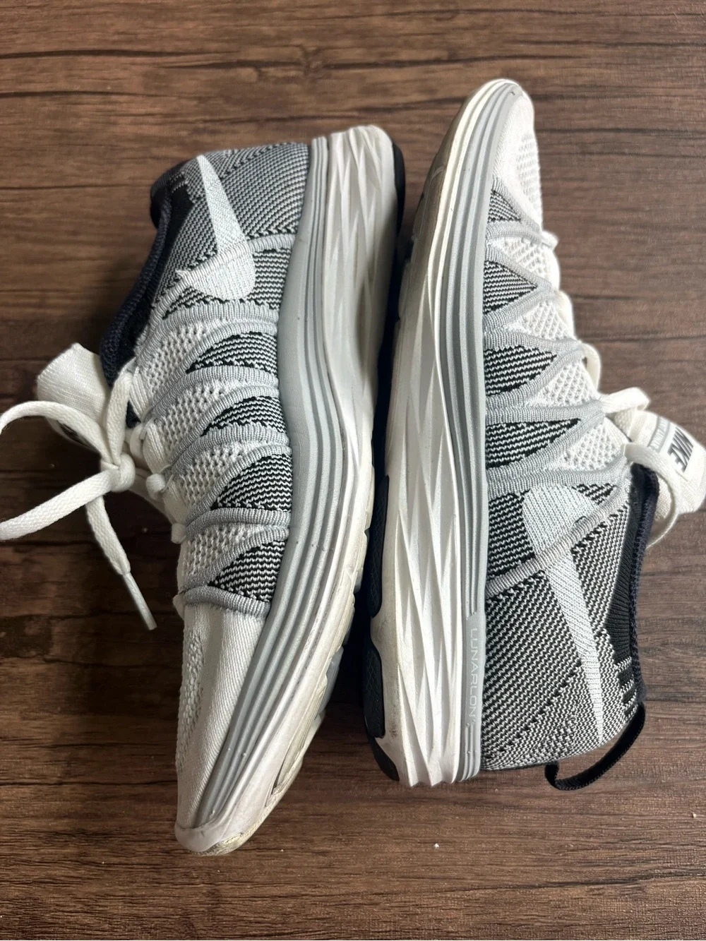 Nike Women’s White and Black Flyknit Sneakers - Picture 2 of 7